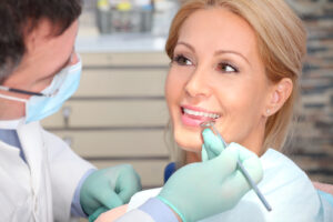 blond lady in dental chair