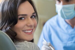 woman smiling in dental chair