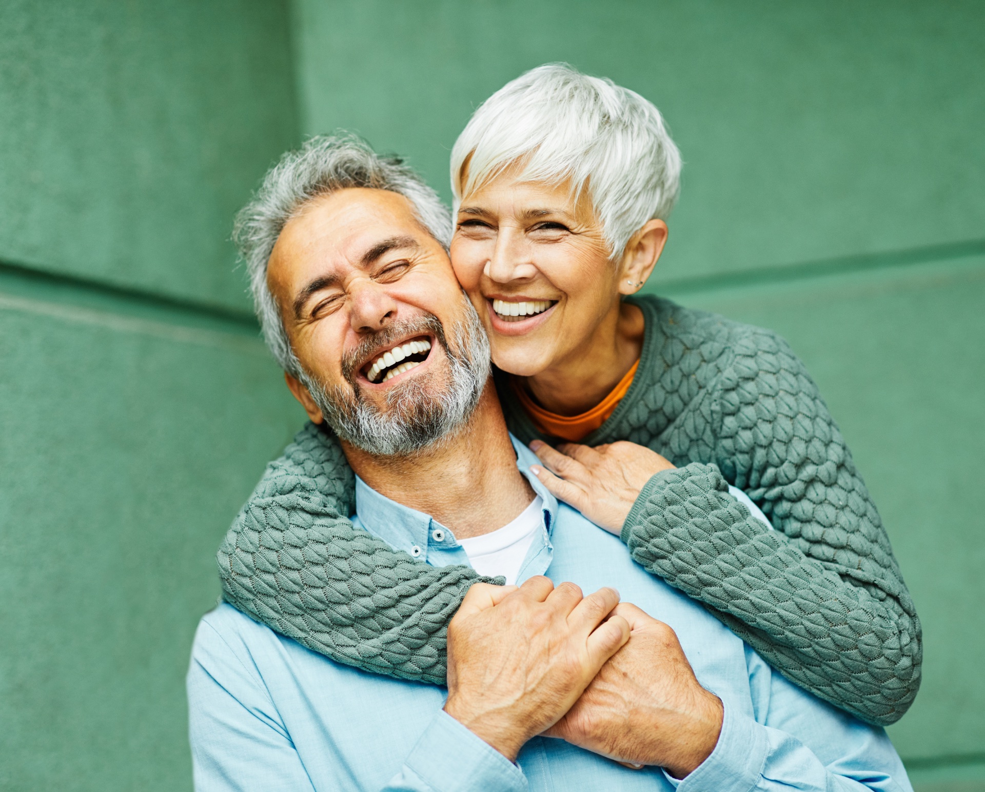 Older Couple Smiling and Hugging